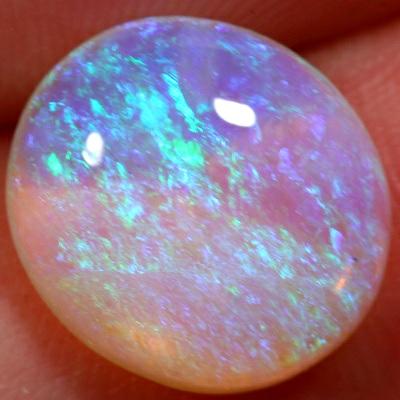SOLID CRYSTAL OPAL 3D pattern, green over a mauve hue